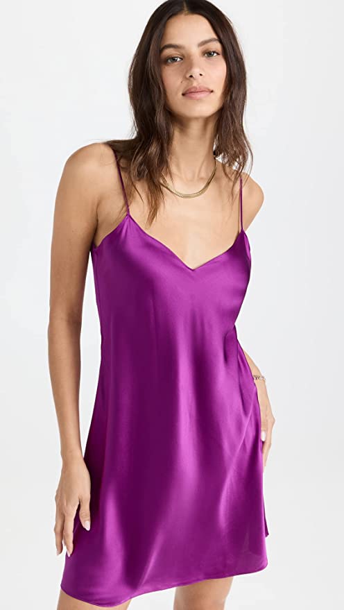 model wearing 90s fashion Y2K DANNIJO Women's Mini Slip Dress Metallic Purple Cocktail Style or Prom Dress Style