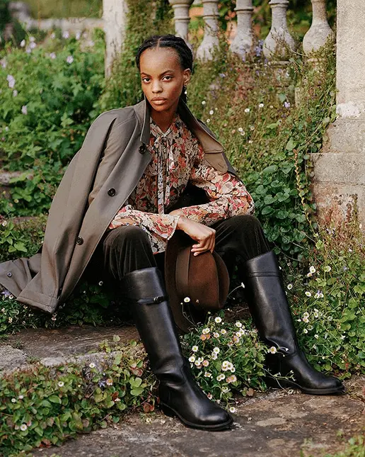 Dark Academia Fashion Model Wearing Fall Jacket, Riding Boots and Blouse