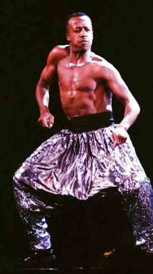 MC Hammer wearing metallic MC Hammer Harem Pants in 1990